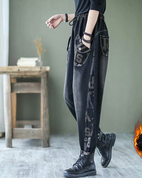 Naiste fliisist teksapüksid lai paelte, tasku ja trükiga mudel