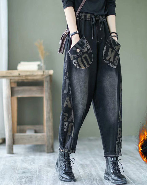 Naiste fliisist teksapüksid lai paelte, tasku ja trükiga mudel