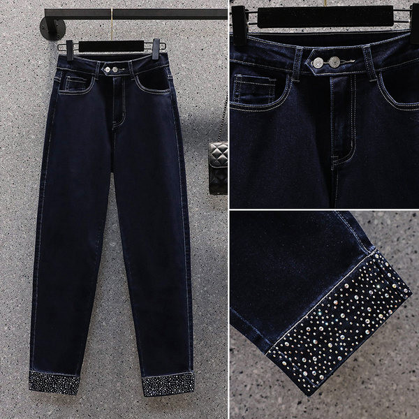 Široki model ženskih traperica s visokim strukom i ukrasnim kamenčićima na nogavicama