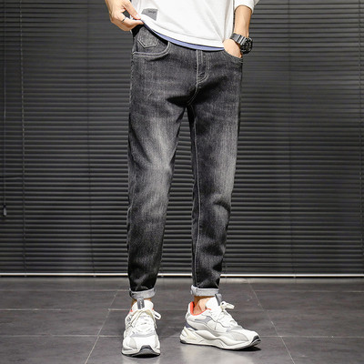 Muške traperice uskog kroja s visokim strukom i džepom