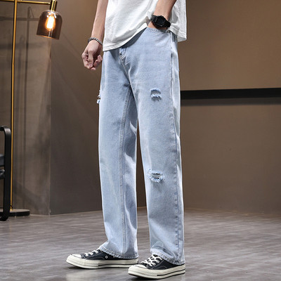 Laia istuvusega meeste teksad, millel on rebenenud motiivid