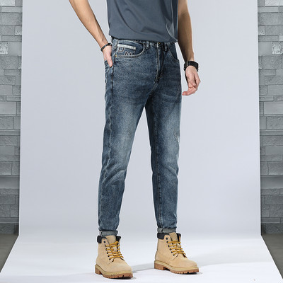 Kõrge vöökohaga nööpidega teksad meestele