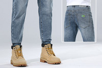 Tasku ja logoga stiilsed meeste teksad