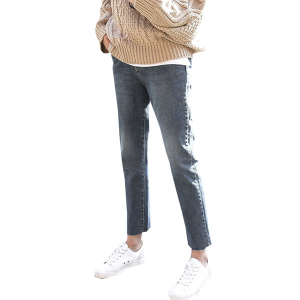 Sirge säärega teksad kõrge vöökoha ja taskuga