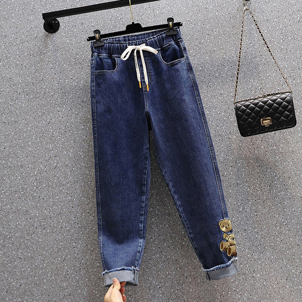 Plataus modelio moteriški džinsai su raišteliais ir siuvinėjimais