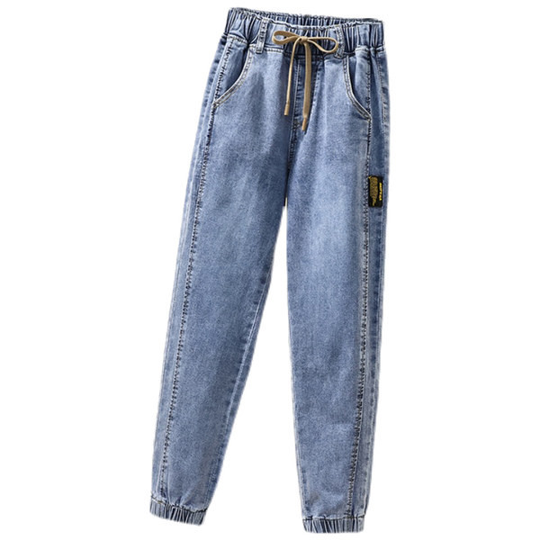 Moteriški džinsai su raišteliais ir tamprėmis ant kojų