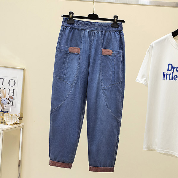 Naiste vabaaja teksad taskutega – sinine värv