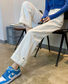 Ženske traperice na gumbe u dvije boje