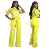 Γυναικεία επίσημη ολόσωμη φόρμα με ψηλό γιακά και κέντημα