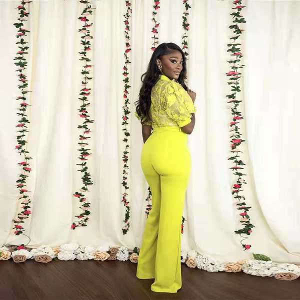 Γυναικεία επίσημη ολόσωμη φόρμα με ψηλό γιακά και κέντημα