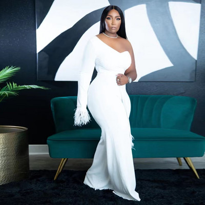 Stiilne naiste ühevarrukaline vööga sulekombine