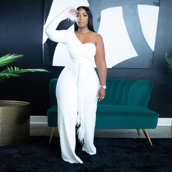 Stiilne naiste ühevarrukaline vööga sulekombine