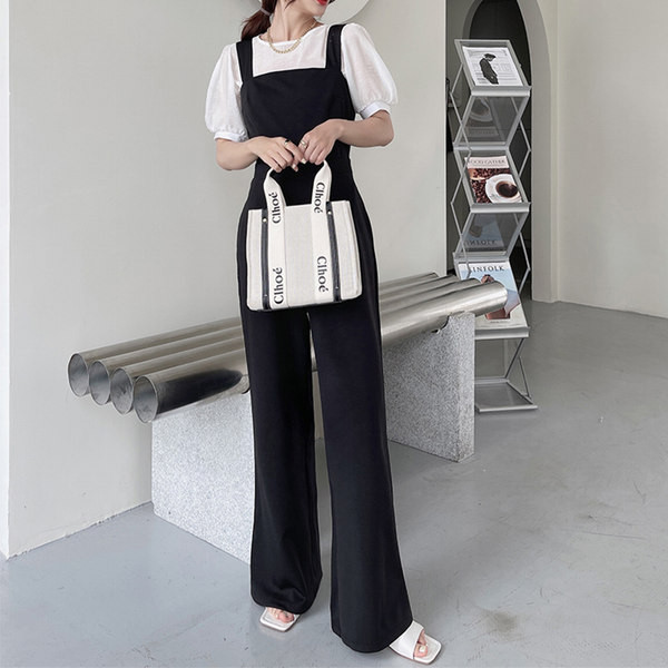 Νέο μοντέλο γυναικεία ολόσωμη φόρμα με τιράντες σε μαύρο χρώμα