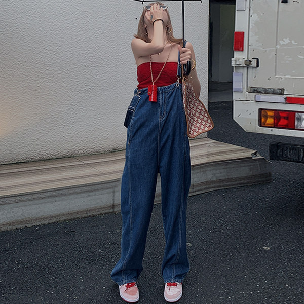 Reguleeritavate rihmade ja taskuga avar naiste kombinesoon