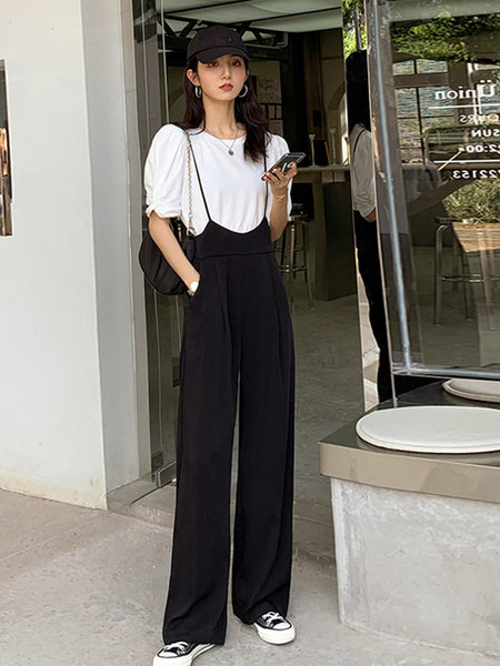 Γυναικεία φαρδιά φόρμα μοντέλου με ψηλόμεσο και τιράντες