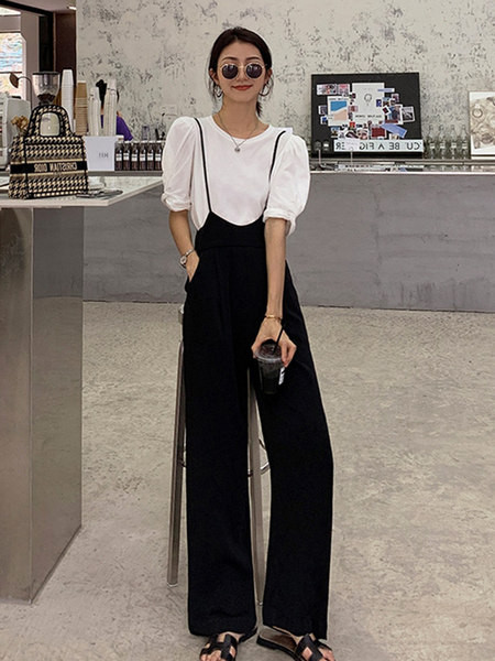 Γυναικεία φαρδιά φόρμα μοντέλου με ψηλόμεσο και τιράντες