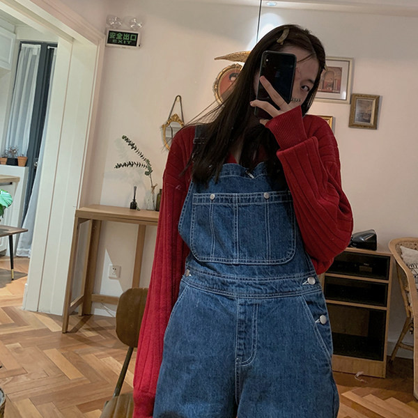 Naiste kõrge vöökoha ja taskuga kombinesoon