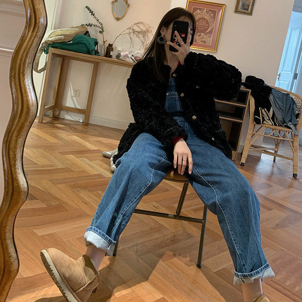 Naiste kõrge vöökoha ja taskuga kombinesoon