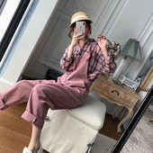 Salopetă din denim de culoare uni cu nasturi