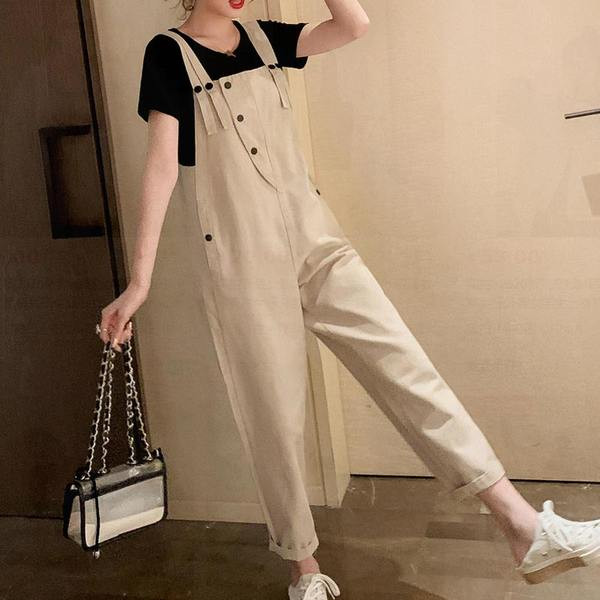 Laia mustriga naiste nööpidega kombinesoon