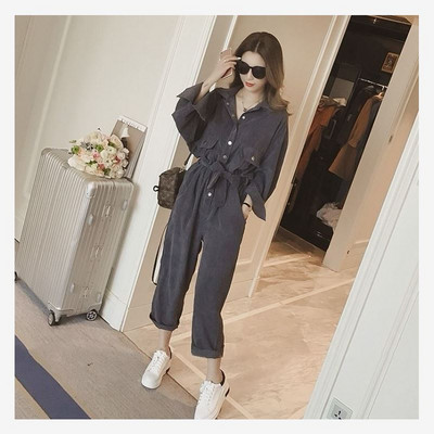 Kõrge vöökoha, nööpide ja taskuga vabaaja kombinesoon