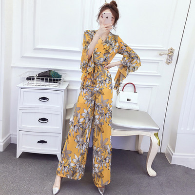 Naiste laia mudeliga kombinesoon lillemotiividega