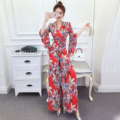 Naiste laia mudeliga kombinesoon lillemotiividega