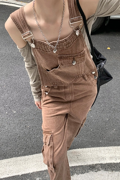 Ležerni ženski traper kombinezon s džepovima sa strane