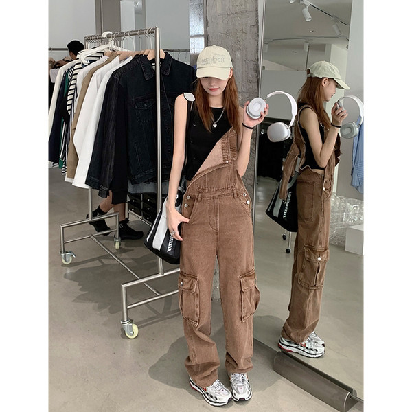 Ležerni ženski traper kombinezon s džepovima sa strane