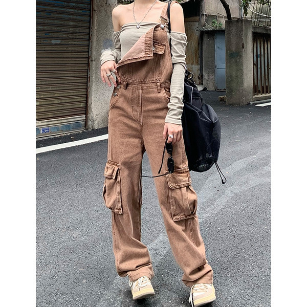 Ležerni ženski traper kombinezon s džepovima sa strane