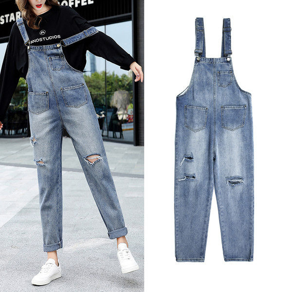 Tasku ja rebenenud motiiviga naiste teksakombinesoon