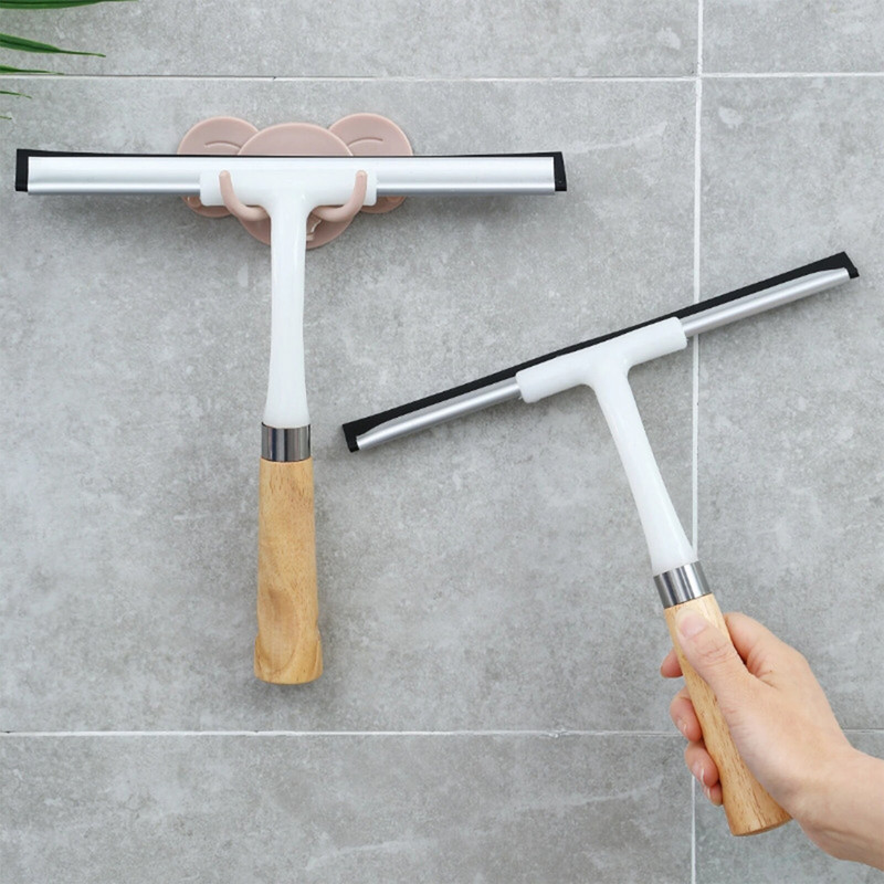 Puidust käepidemega puhastuskaabits, mida on lihtne eemaldada plekkide pesemiseks ja kuivatamiseks