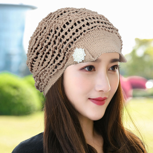 Ženska pletena kapa u više boja