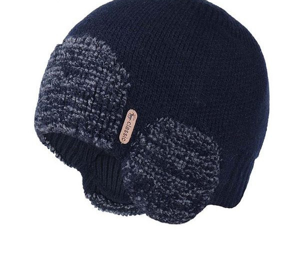 Ženska zimska kapa s perom