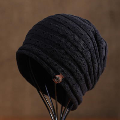 Τρέχον χειμερινό καπέλο με δερμάτινο στοιχείο