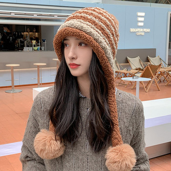 Нов модел зимна дамска шапка с помпони