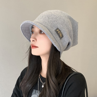 Prugasti ženski šešir sa šilterom