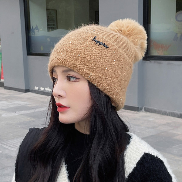 Palarie de dama tricotata cu pompon