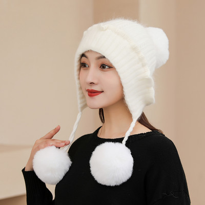 Naiste talvemüts paelte ja pon-poniga