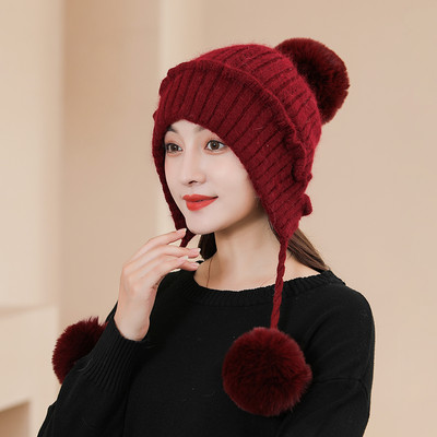 Naiste talvemüts paelte ja pon-poniga