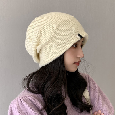 Γυναικείο χειμερινό καπέλο με τρισδιάστατο στοιχείο