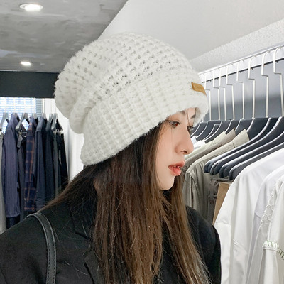 Πλεκτό χειμωνιάτικο καπέλο με λογότυπο και πον-πον