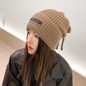 Γυναικείο χειμωνιάτικο πλεκτό καπέλο με γράμματα και κορδόνια