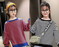 Ovaalse kaelusega ja pikkade varrukatega triibuline pluus tüdrukule