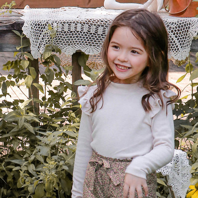 Uue mudeli lokkidega lastepluus tüdrukutele