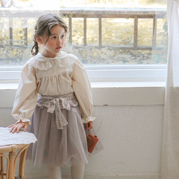 Moodne pitsiga lastepluus