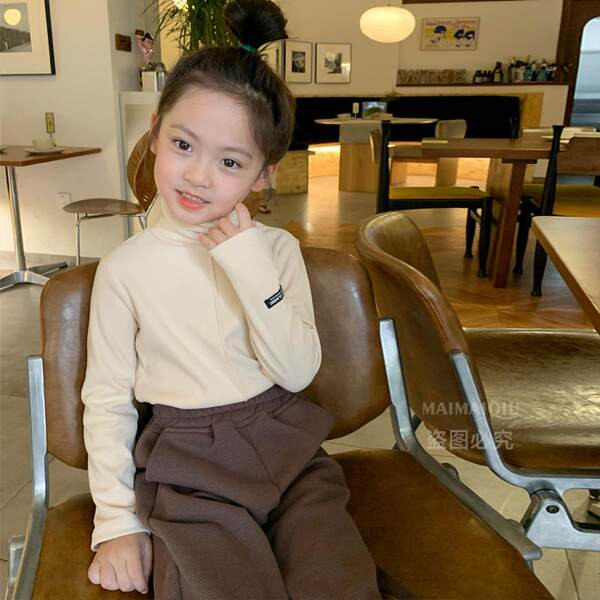 Ühevärviline kõrge polo kraega pluus tüdrukutele