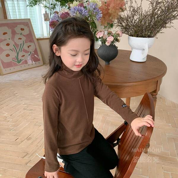 Ühevärviline kõrge polo kraega pluus tüdrukutele