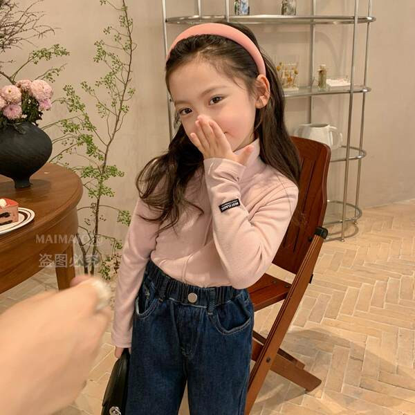 Ühevärviline kõrge polo kraega pluus tüdrukutele