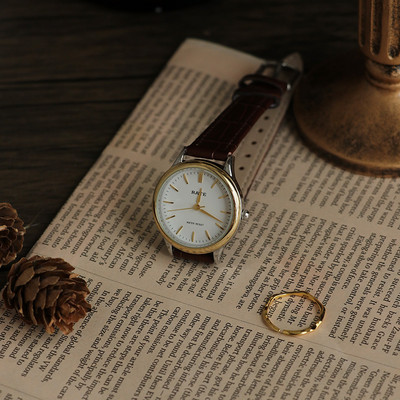 Ženski sat - okruglog oblika